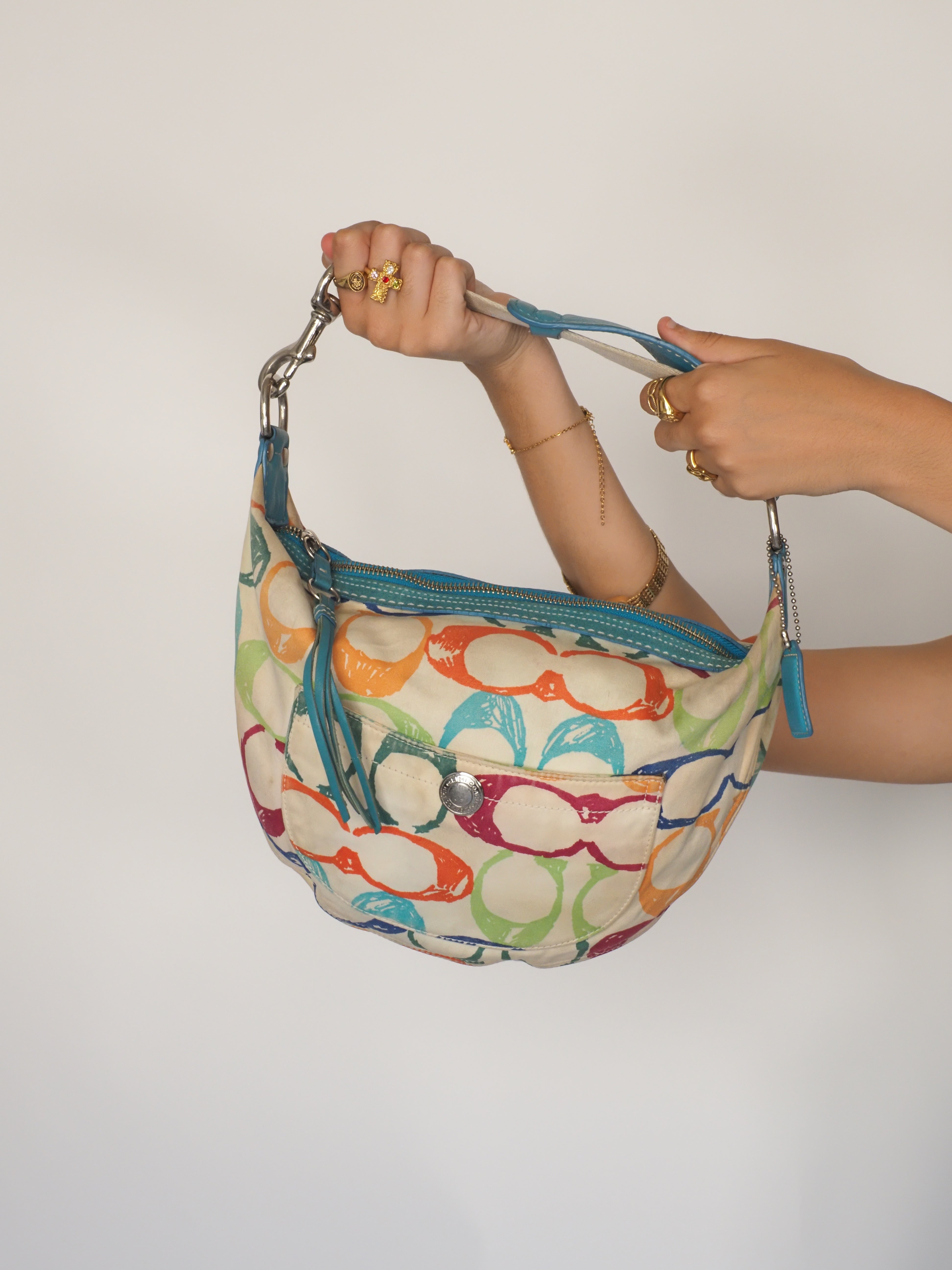 Coach Scribble Multicolor Signature C Hobo – Cream Canvas with Vibrant Multi‑Color “C” Print & Turquoise Trim