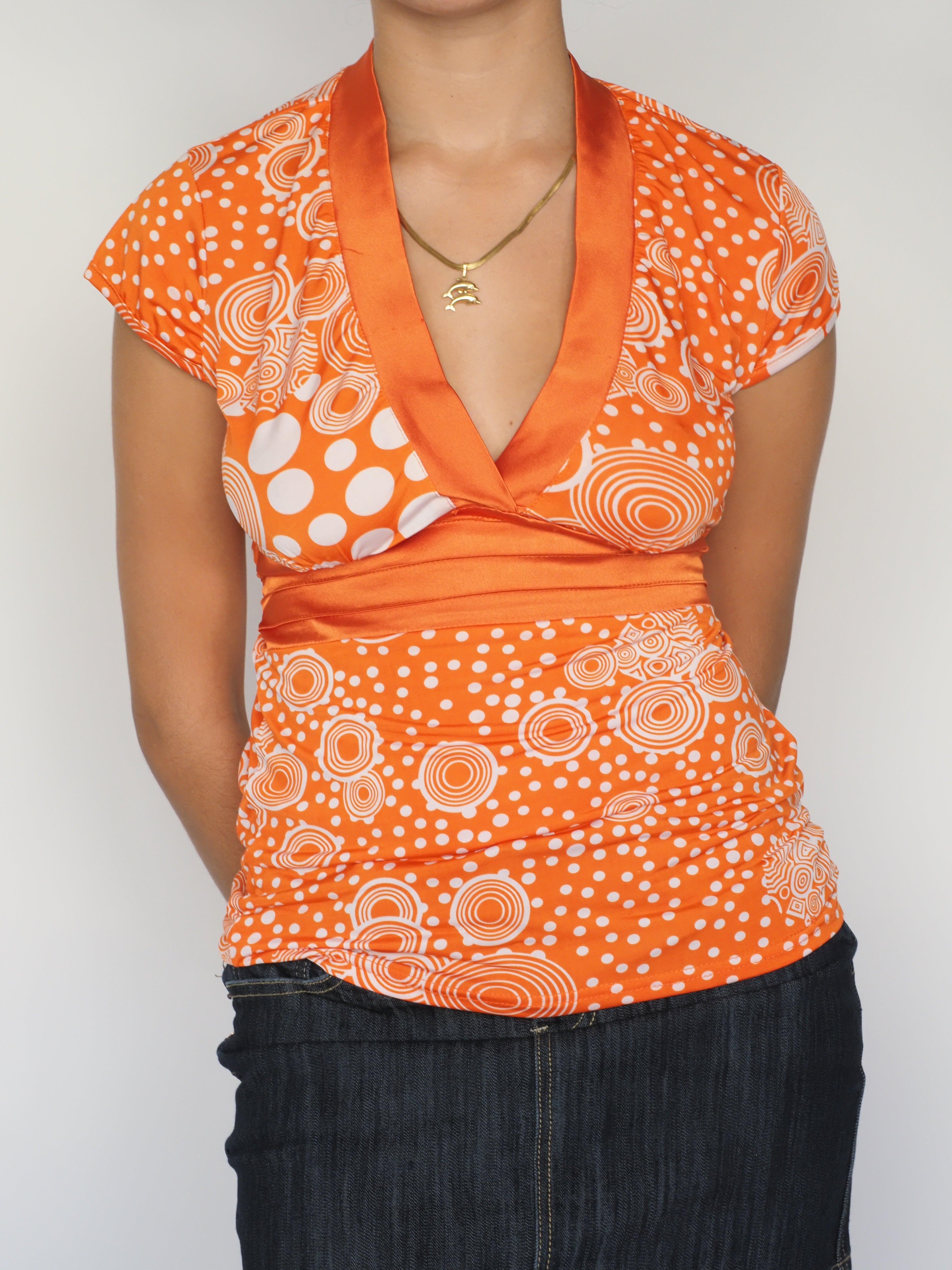 Xazi Retro Orange Satin-Trim Print Top – Circle Pattern